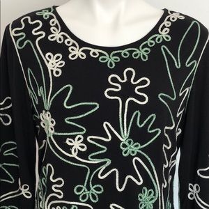 Black top with embroidered design. Sz XL.